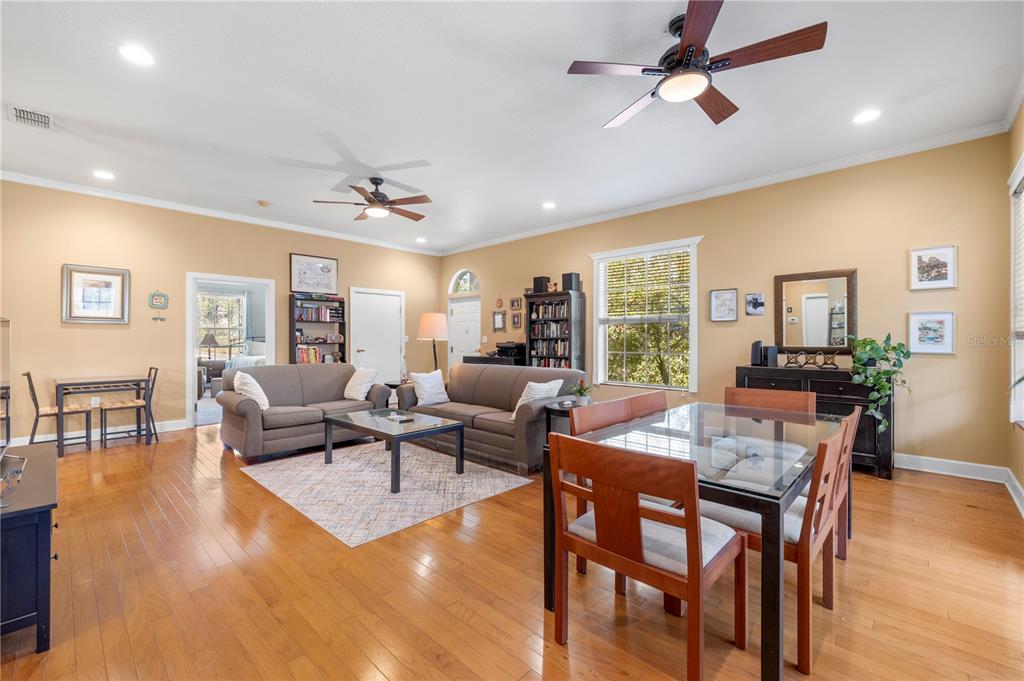 11951 Sheldon Road Tampa, FL 33626 - Photo 12 of 51 a living room with furniture dining table and a window