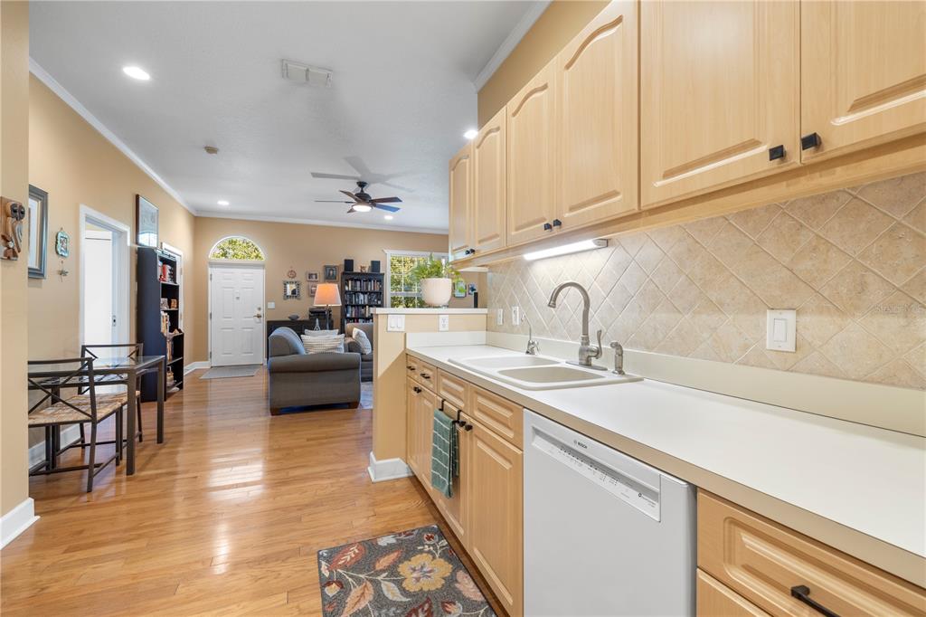 11951 Sheldon Road Tampa, FL 33626 - Photo 20 of 51 a kitchen with a sink and cabinets