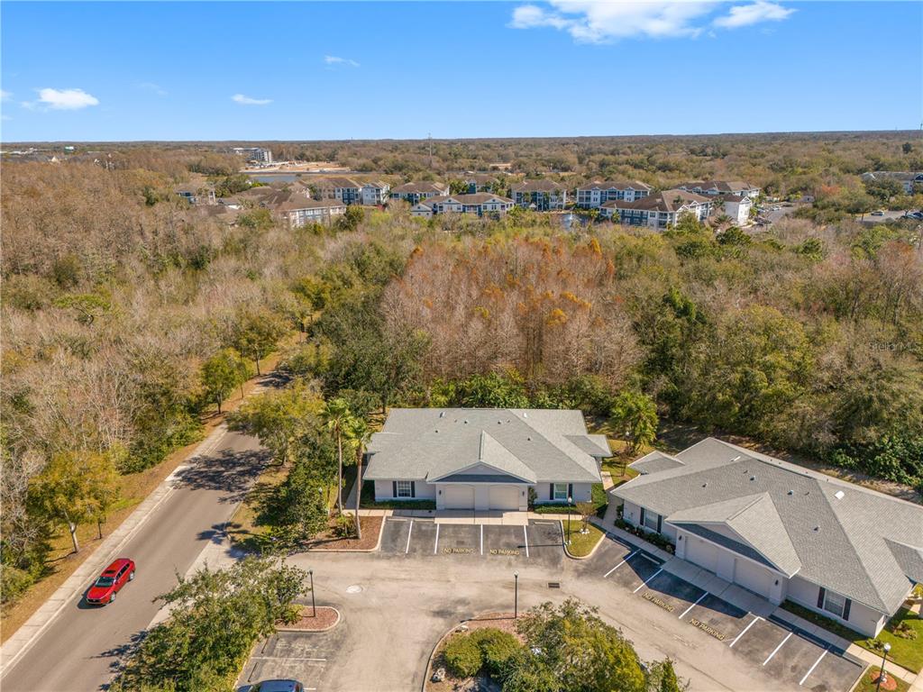 11951 Sheldon Road Tampa, FL 33626 - Photo 45 of 51 an aerial view of a house with a lake view