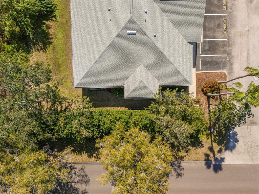 11951 Sheldon Road Tampa, FL 33626 - Photo 47 of 51 a aerial view of a house with a yard and garden