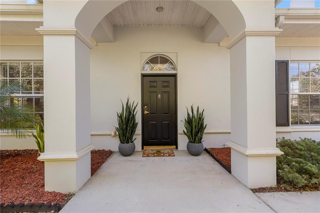 11951 Sheldon Road Tampa, FL 33626 - Photo 7 of 51 a view of a door of the house