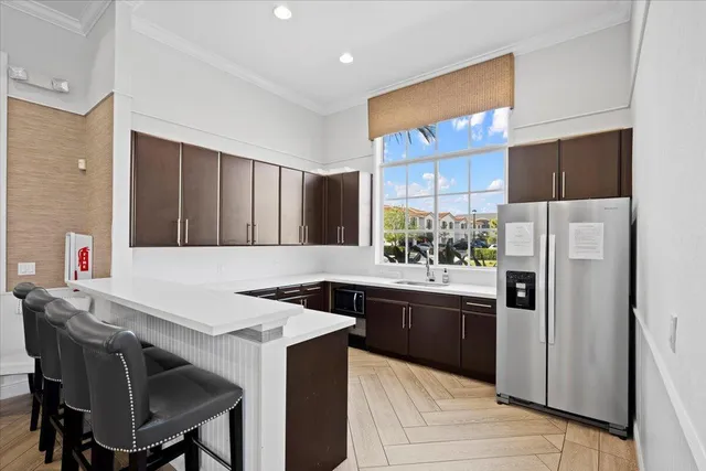 a kitchen that has a cabinets and a stove