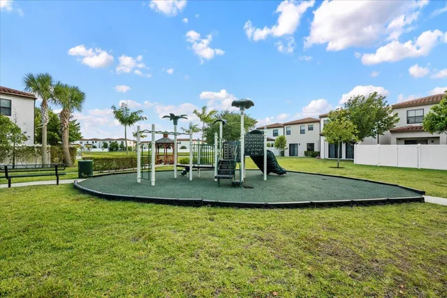 a view of a house with a swimming pool