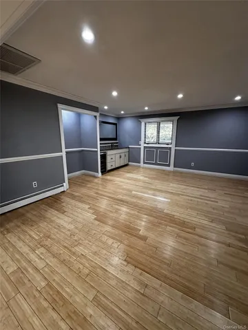 a view of a livingroom with a large window