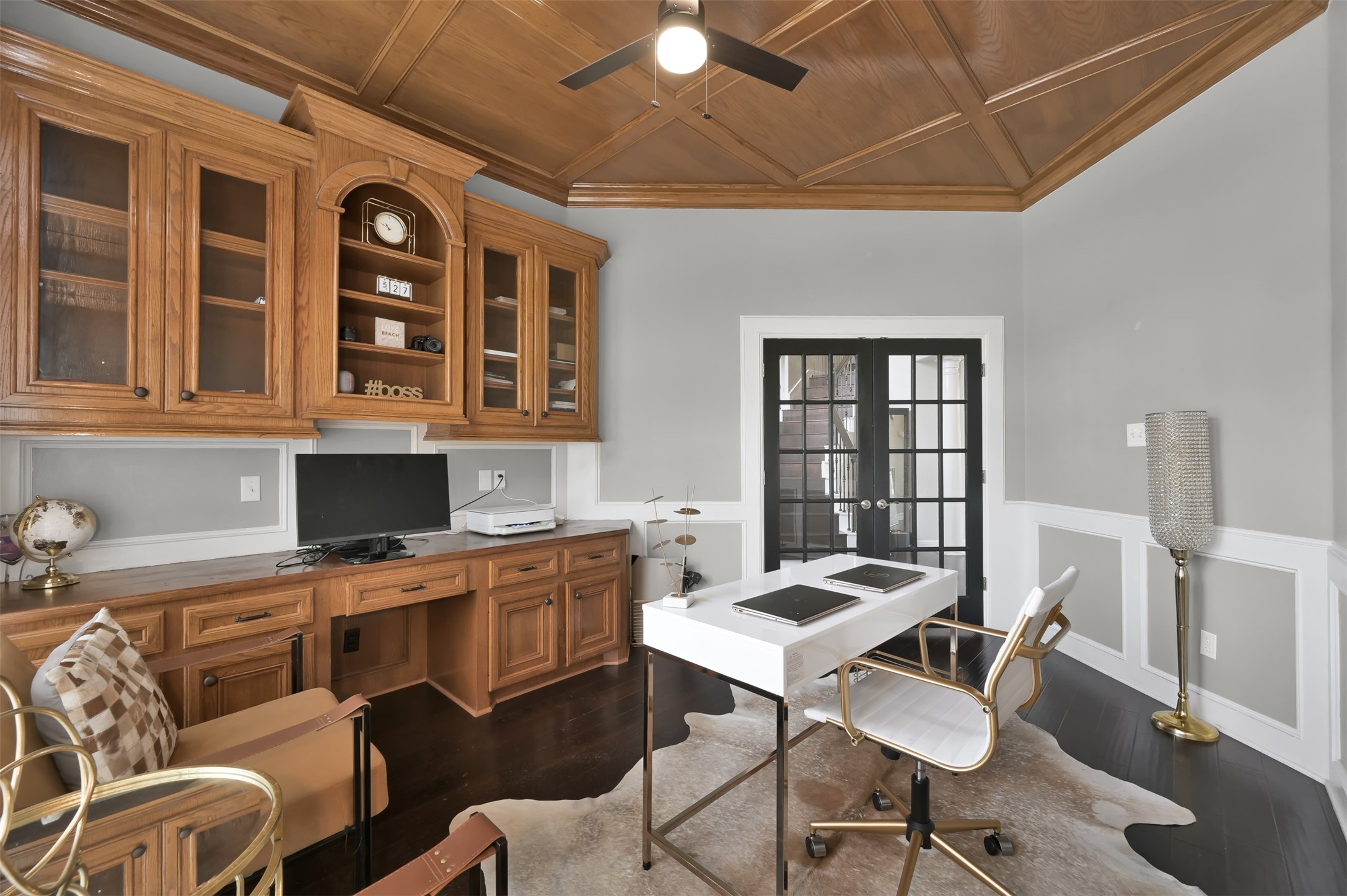 9706 Chipstead Court Spring, TX 77379 - Photo 9 of 44 The spacious built ins give you flexibility to utilize extra storage space and to have two workspaces set up if you have multiple people who need to use this space.