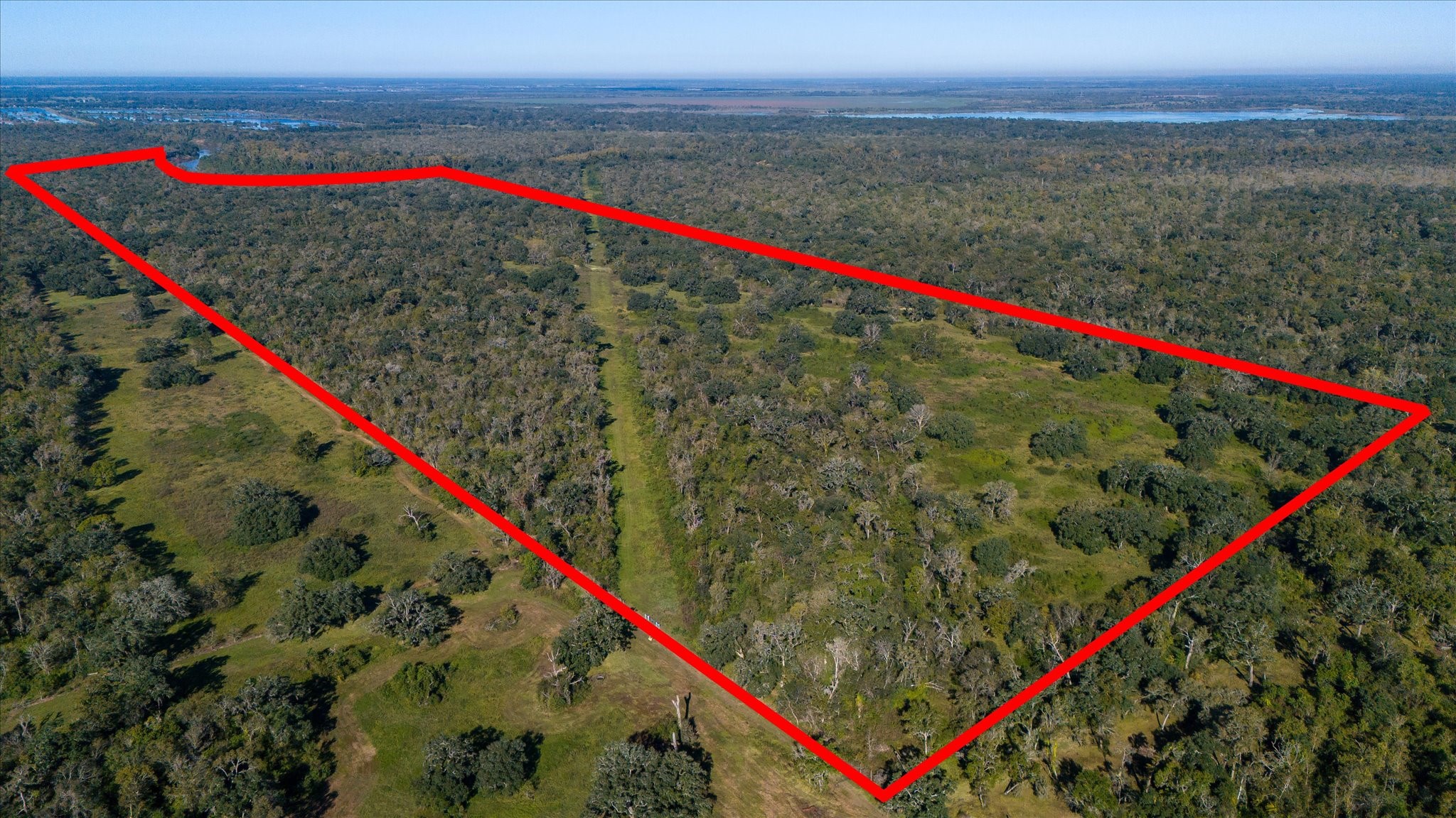 0 Cr 611 Angleton Tx 77515 Angleton, TX 77515 - Photo 8 of 33 a view of a yard with an ocean view