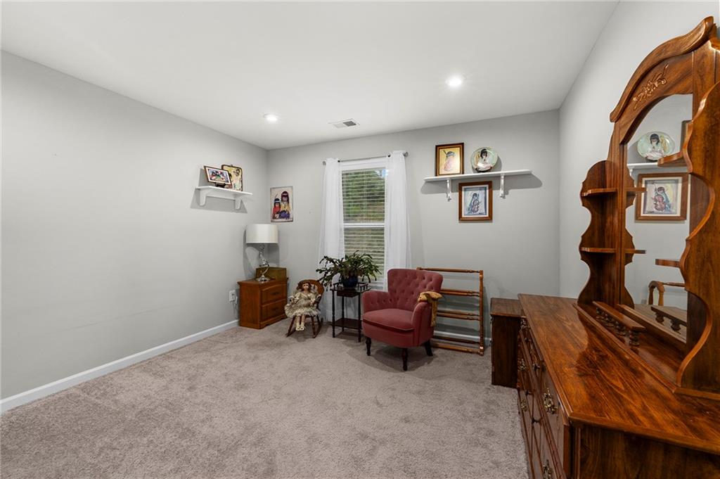 230 Augusta Walk Canton, GA 30114 - Photo 36 of 56 a living room with furniture and a window