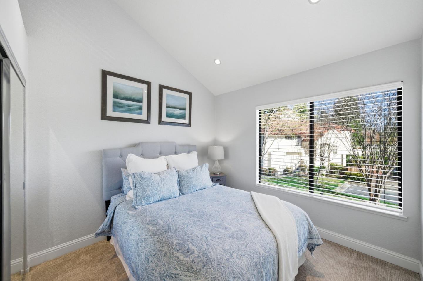 3030 Lakemont Drive, Unit 3 San Ramon, CA 94582 - Photo 22 of 43 a bedroom with a large bed and a large window