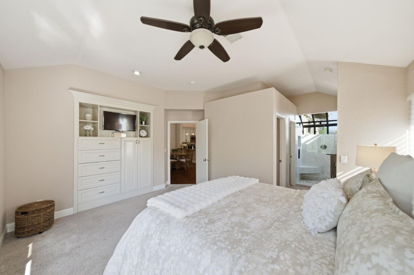3030 Lakemont Drive, Unit 3 San Ramon, CA 94582 - Photo 24 of 43 a bedroom with a bed chandelier and a window