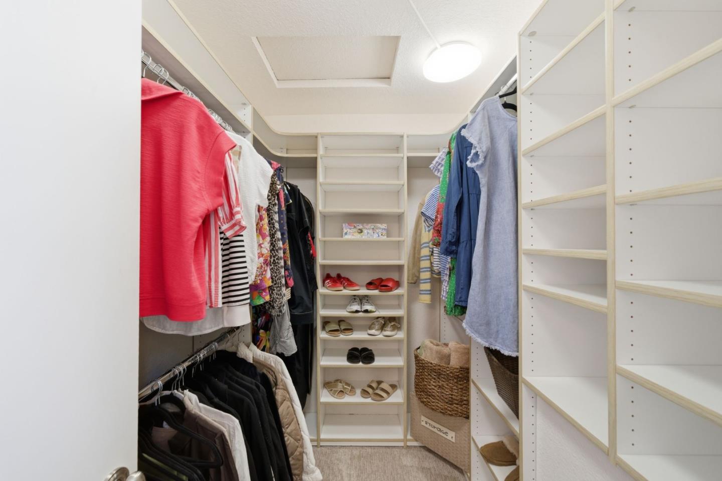 3030 Lakemont Drive, Unit 3 San Ramon, CA 94582 - Photo 27 of 43 a view of walk in closet with clothes and shoes