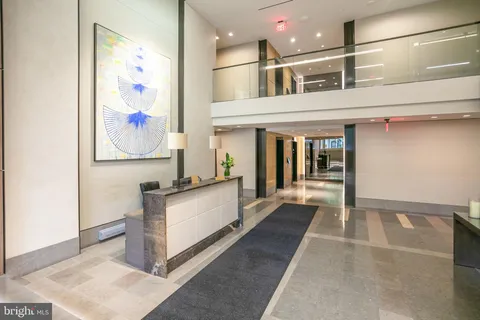 a view of living room with a large window
