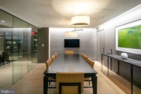 a view of a building with a umbrellas