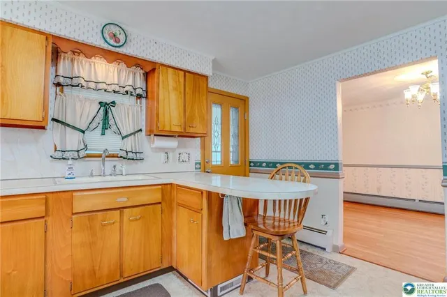 a view of a kitchen area with furniture and window