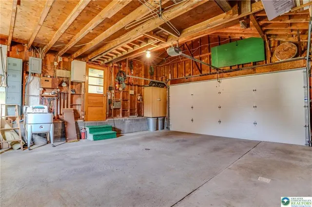 a utility room with furniture and a window