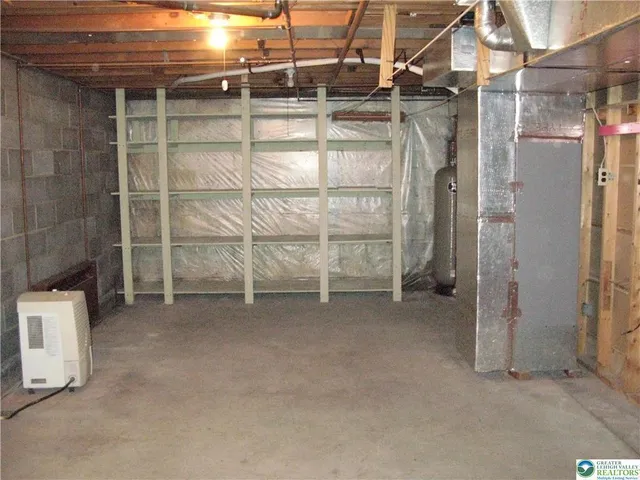 a picture of a bathroom with a window