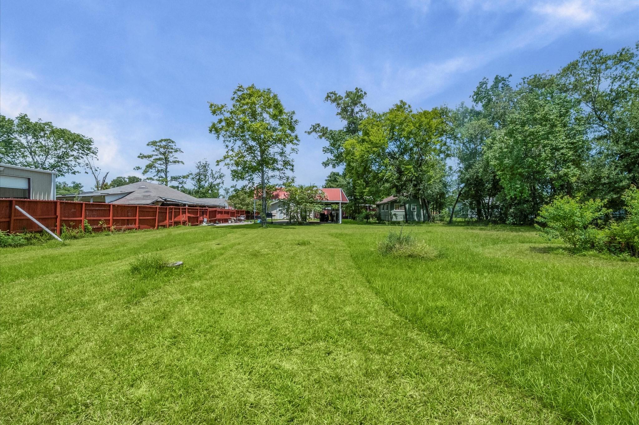 16032 1/2 Ridlon Street Channelview, TX 77530 - Photo 15 of 44 a view of yard with grass and a trees