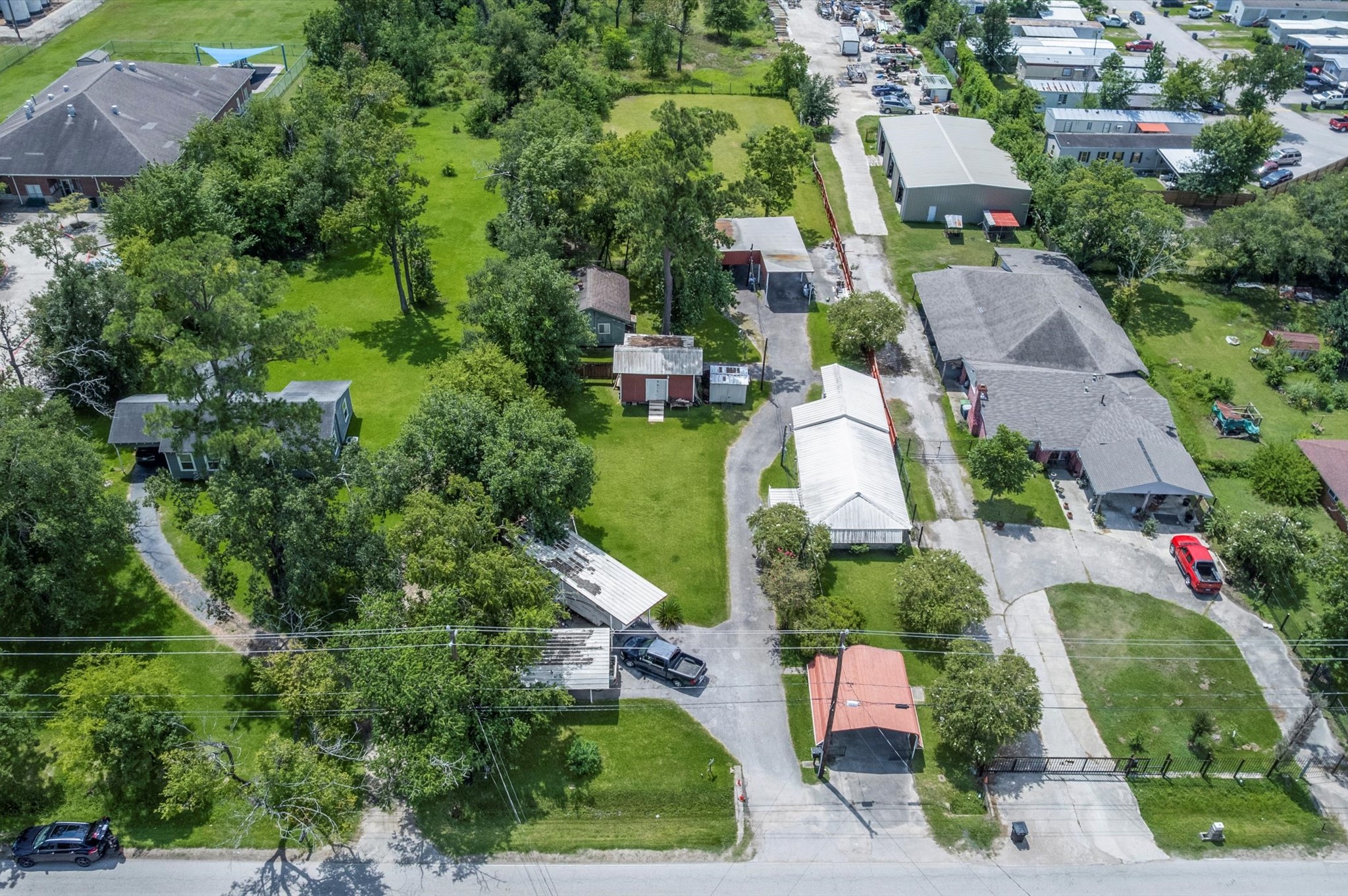 16032 1/2 Ridlon Street Channelview, TX 77530 - Photo 16 of 44 an aerial view of residential houses with outdoor space