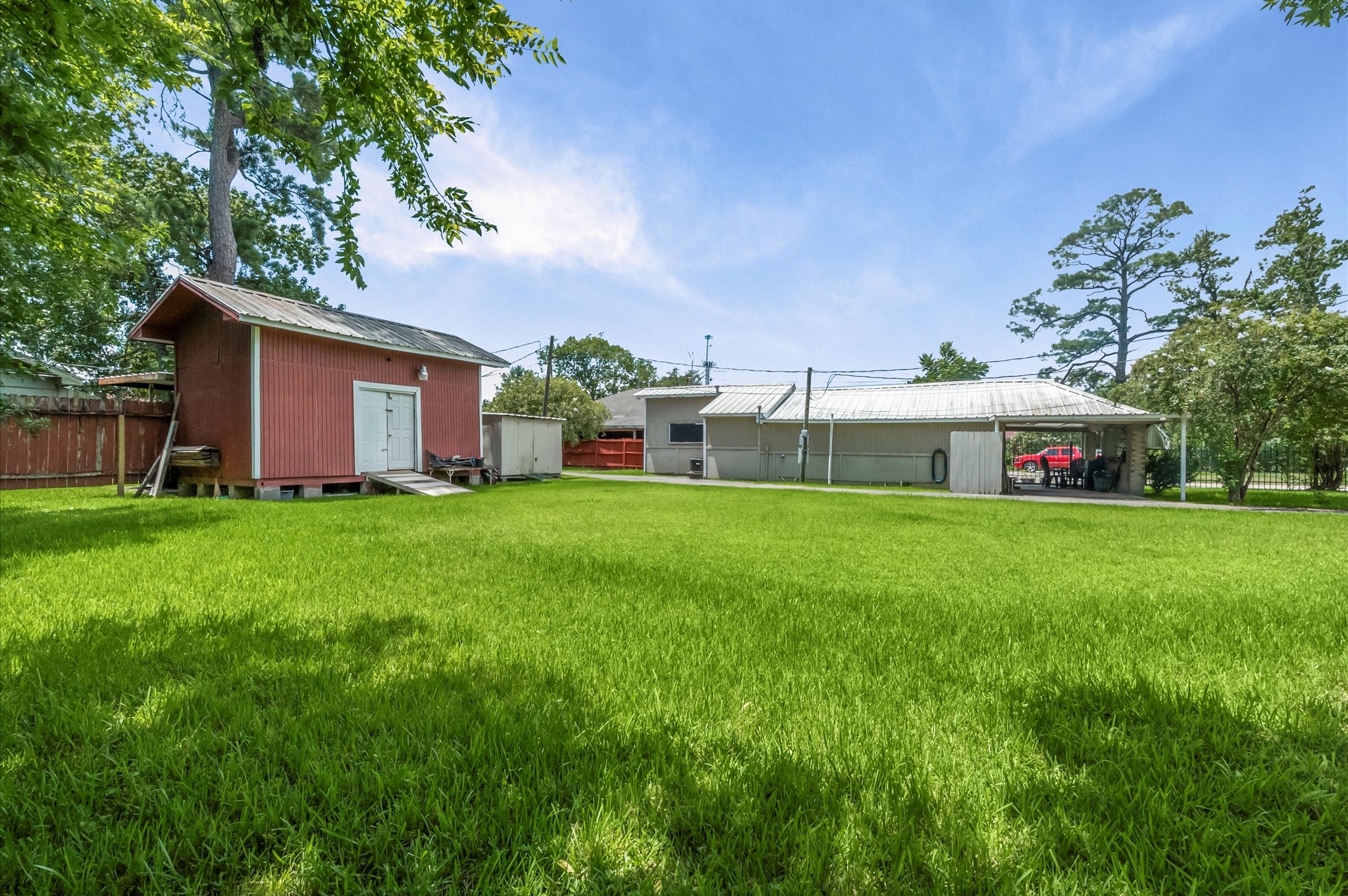 16032 1/2 Ridlon Street Channelview, TX 77530 - Photo 2 of 44 a house view with swimming pool in front of it