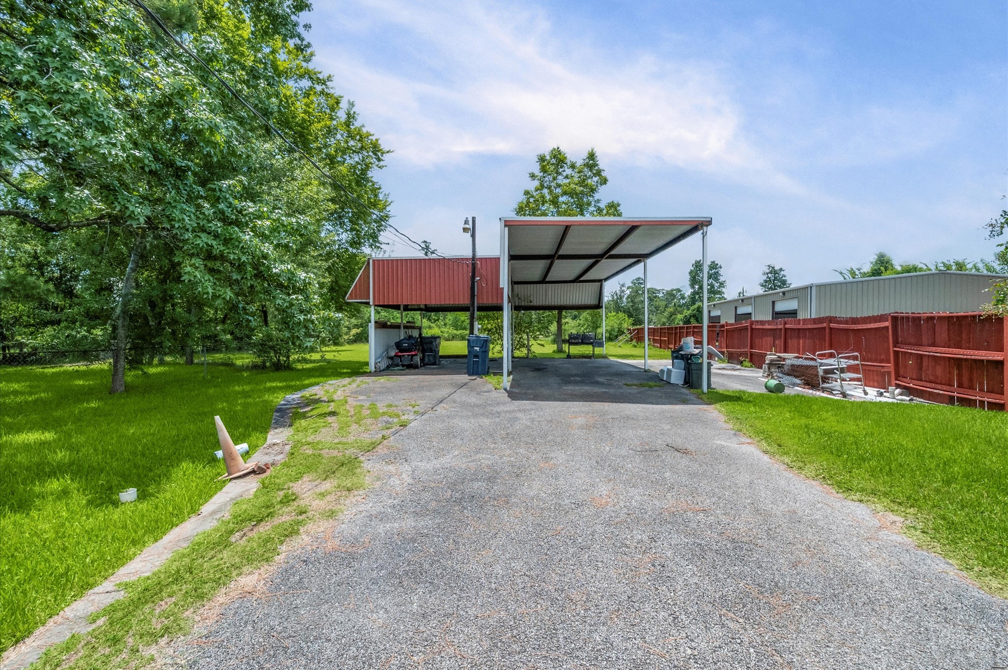 16032 1/2 Ridlon Street Channelview, TX 77530 - Photo 24 of 44 a view of a yard with a street