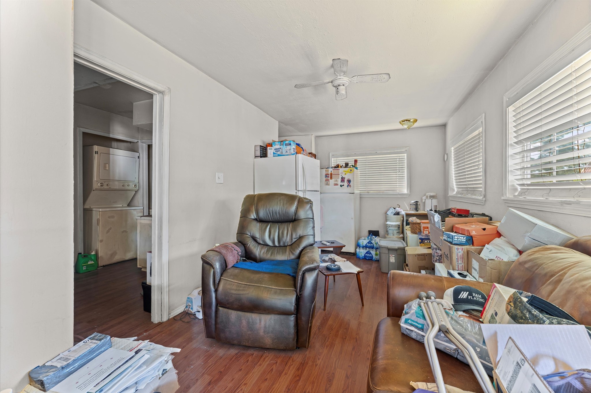 16032 1/2 Ridlon Street Channelview, TX 77530 - Photo 25 of 44 a living room with furniture and a wooden floor