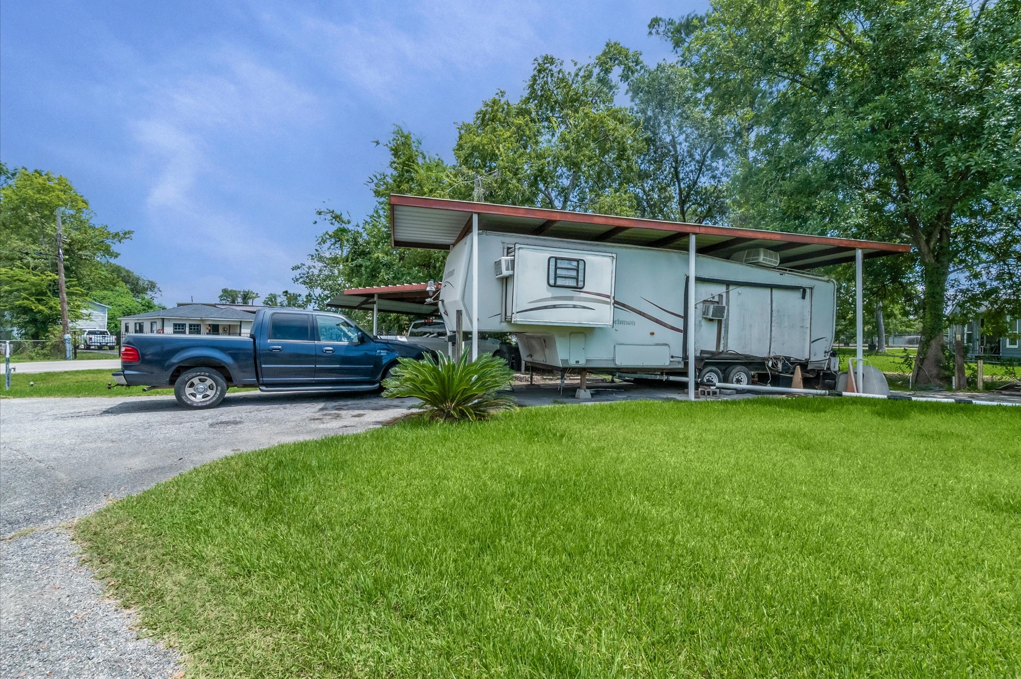 16032 1/2 Ridlon Street Channelview, TX 77530 - Photo 27 of 44 a view of a house with a back yard