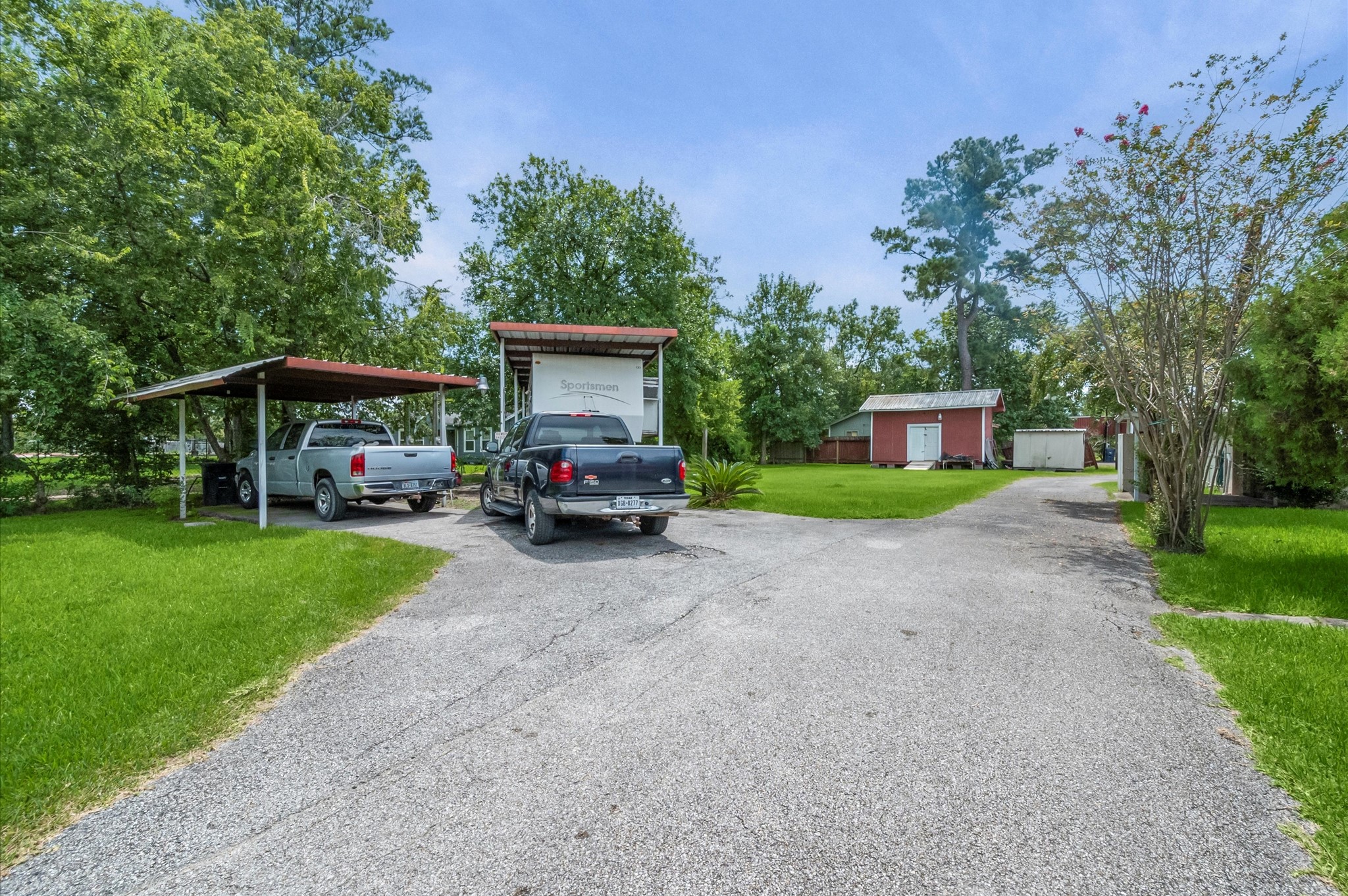 16032 1/2 Ridlon Street Channelview, TX 77530 - Photo 29 of 44 a view of a house with a garden
