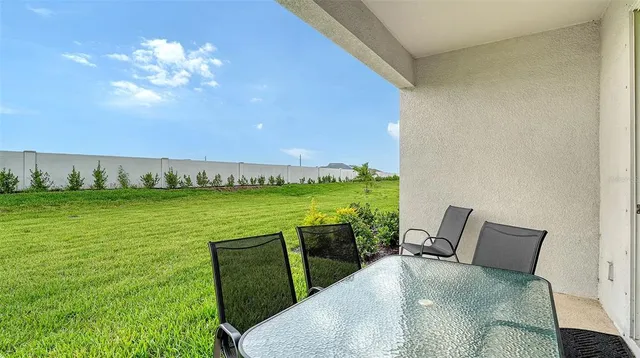 a view of a dining room with furniture window and garden