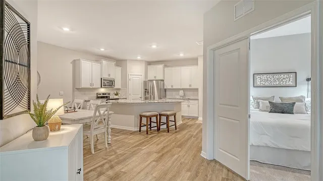 a view of a dining room kitchen and a window