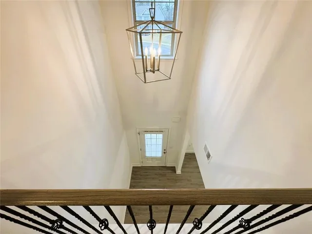 a view of wooden floor and a window