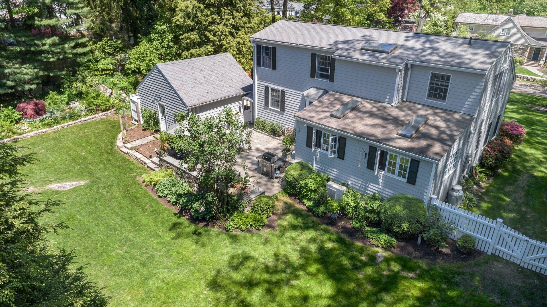 31 Range Road Rowayton, CT 06853 - Photo 23 of 24 a aerial view of a house with a yard plants and large tree