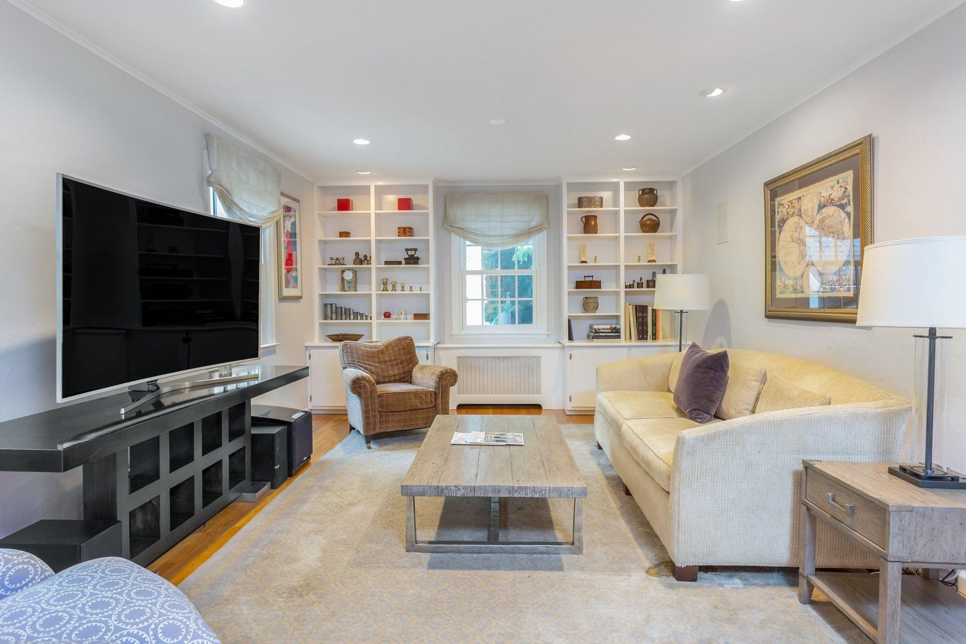 31 Range Road Rowayton, CT 06853 - Photo 7 of 24 a living room with furniture and a flat screen tv