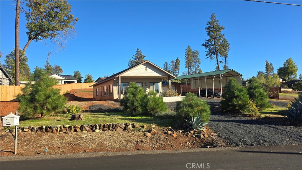 6396 Diamond Paradise, CA 95969 - Photo 1 of 36 a front view of a house with garden