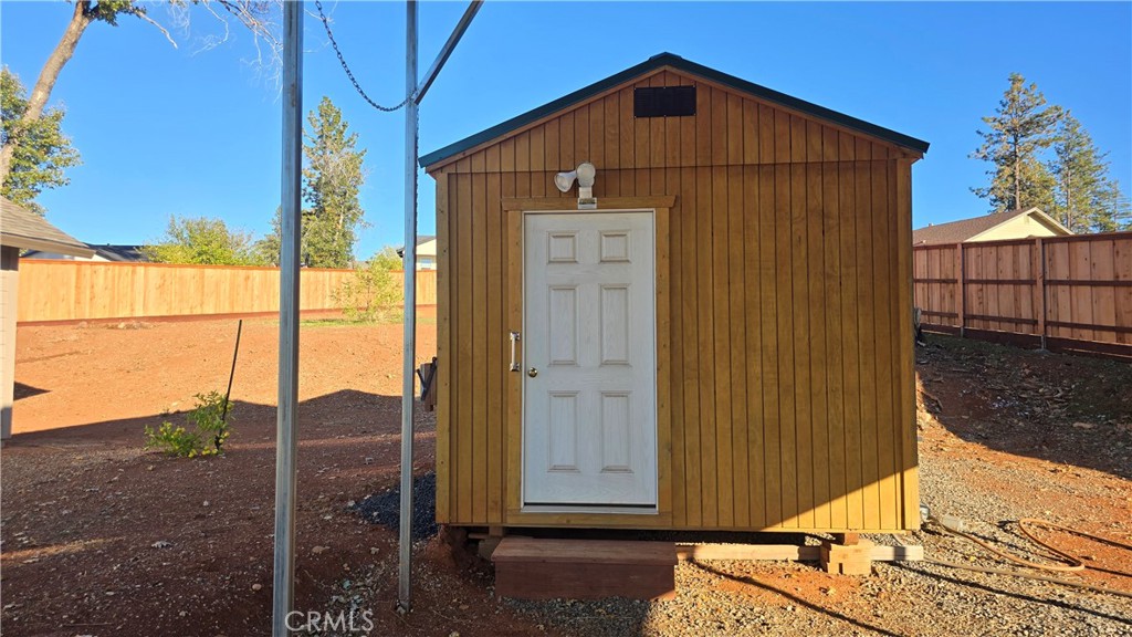 6396 Diamond Paradise, CA 95969 - Photo 12 of 36 a view of a barn house next to a yard