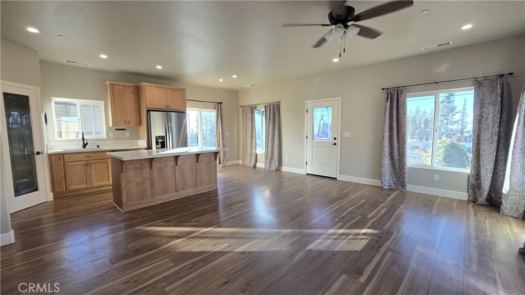 6396 Diamond Paradise, CA 95969 - Photo 16 of 36 a view of a kitchen with wooden floor and a window