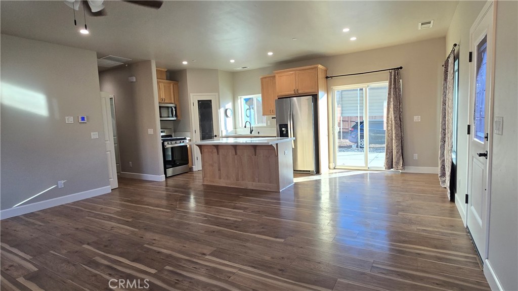 6396 Diamond Paradise, CA 95969 - Photo 17 of 36 an empty room with wooden floor and windows