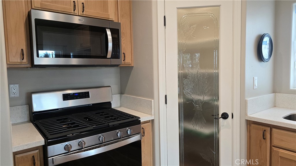 6396 Diamond Paradise, CA 95969 - Photo 21 of 36 a kitchen with a stove and a microwave