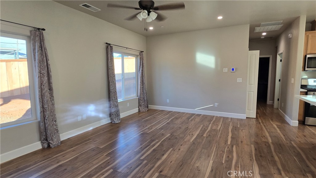 6396 Diamond Paradise, CA 95969 - Photo 27 of 36 wooden floor in an empty room with a window