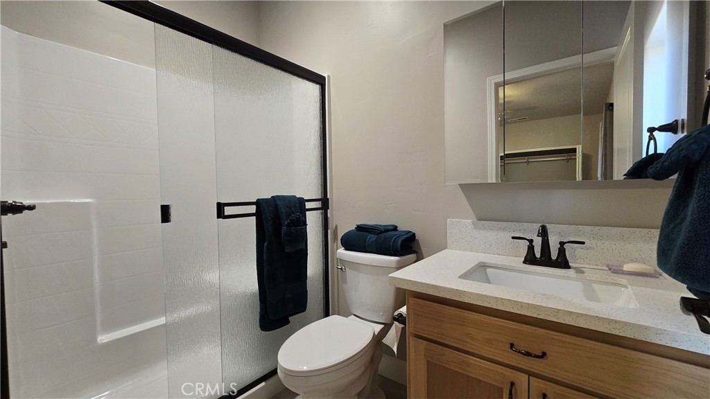 6396 Diamond Paradise, CA 95969 - Photo 30 of 36 a bathroom with a sink a toilet and shower
