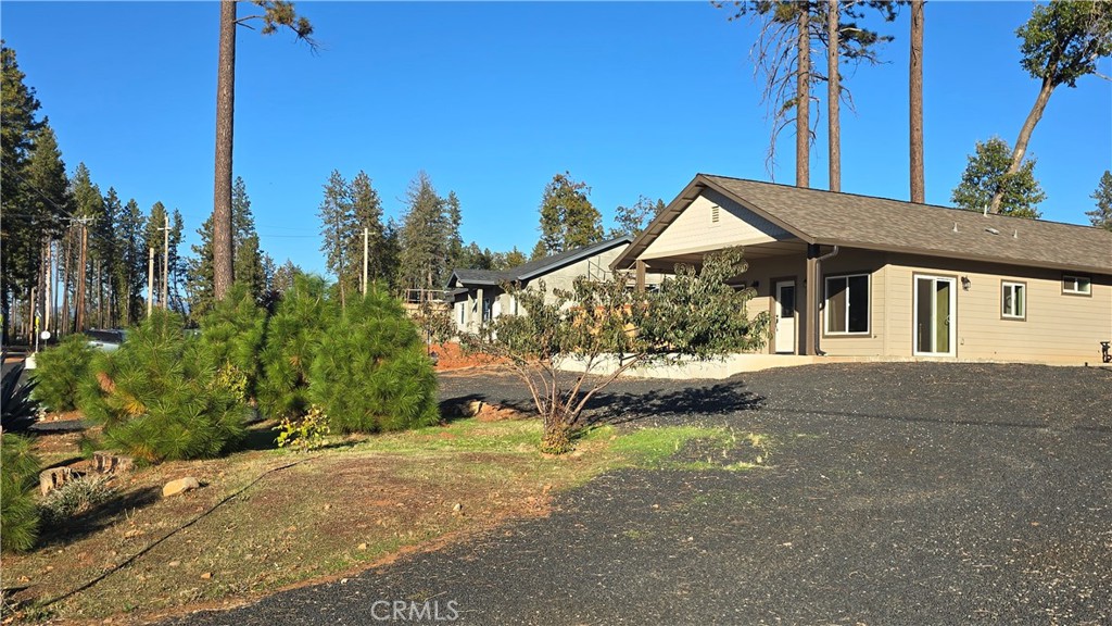6396 Diamond Paradise, CA 95969 - Photo 6 of 36 a front view of a house with a yard