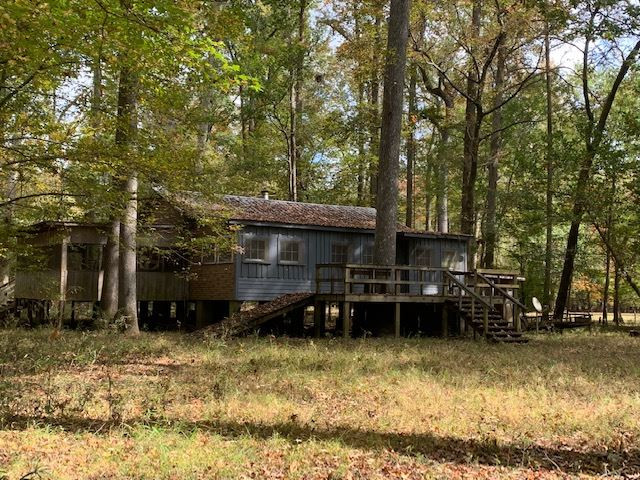 664 Wesley Lake Road Brownsville, TN 38012 - Photo 1 of 1 a view of a car park in front of house