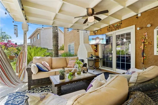 a outdoor living space with furniture and garden view