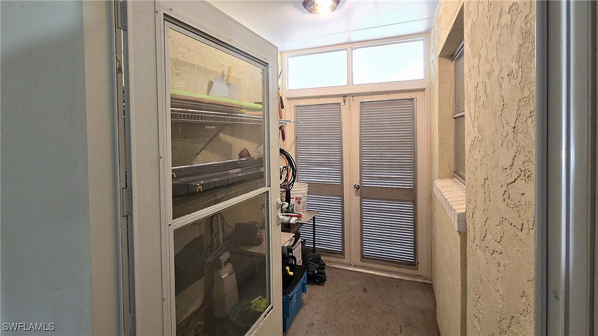 8 Park Ln Circle Lehigh Acres, FL 33936 - Photo 20 of 47 a view of walk in closet