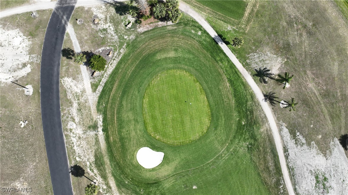 8 Park Ln Circle Lehigh Acres, FL 33936 - Photo 36 of 47 a view of a garden