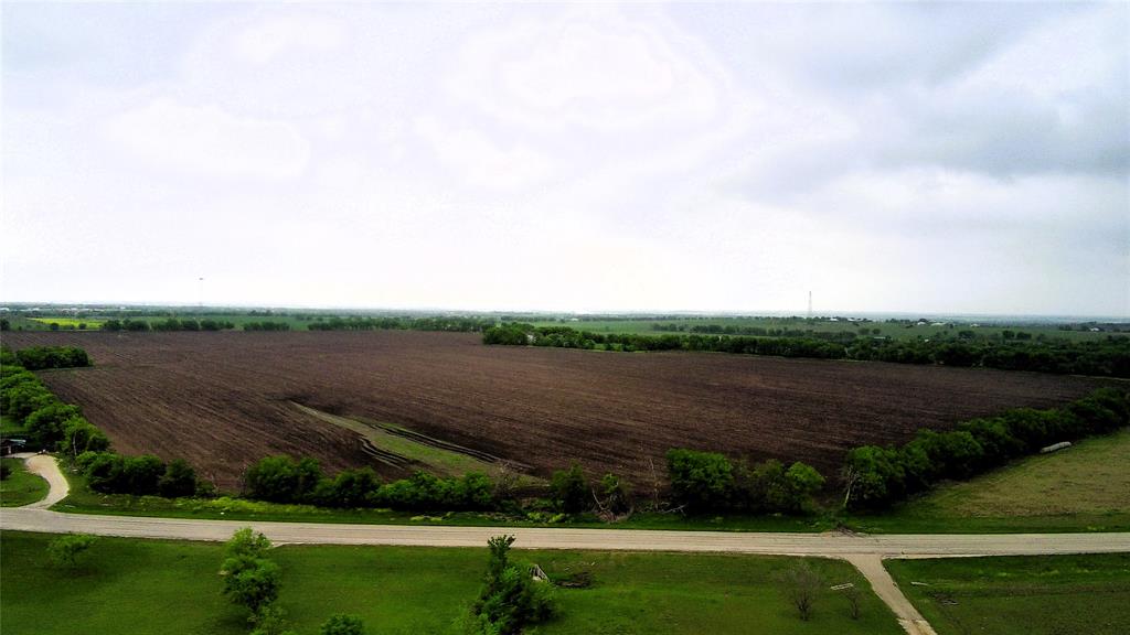 437 County Road 437 Eddy, TX 76524 - Photo 3 of 16 a view of a green field with an outdoor space