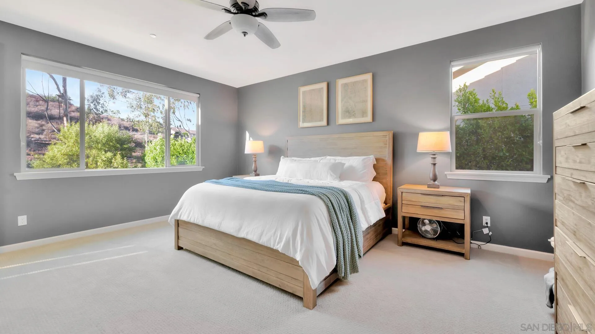 17568 Ralphs Ranch Road San Diego, CA 92127 - Photo 16 of 59 a bedroom with a bed and a window