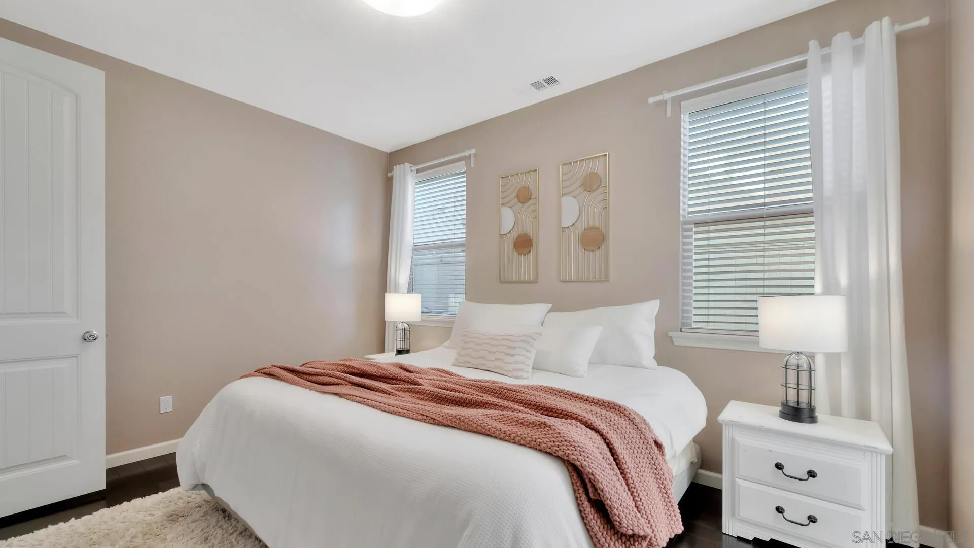 17568 Ralphs Ranch Road San Diego, CA 92127 - Photo 22 of 59 a bedroom with a bed and a window