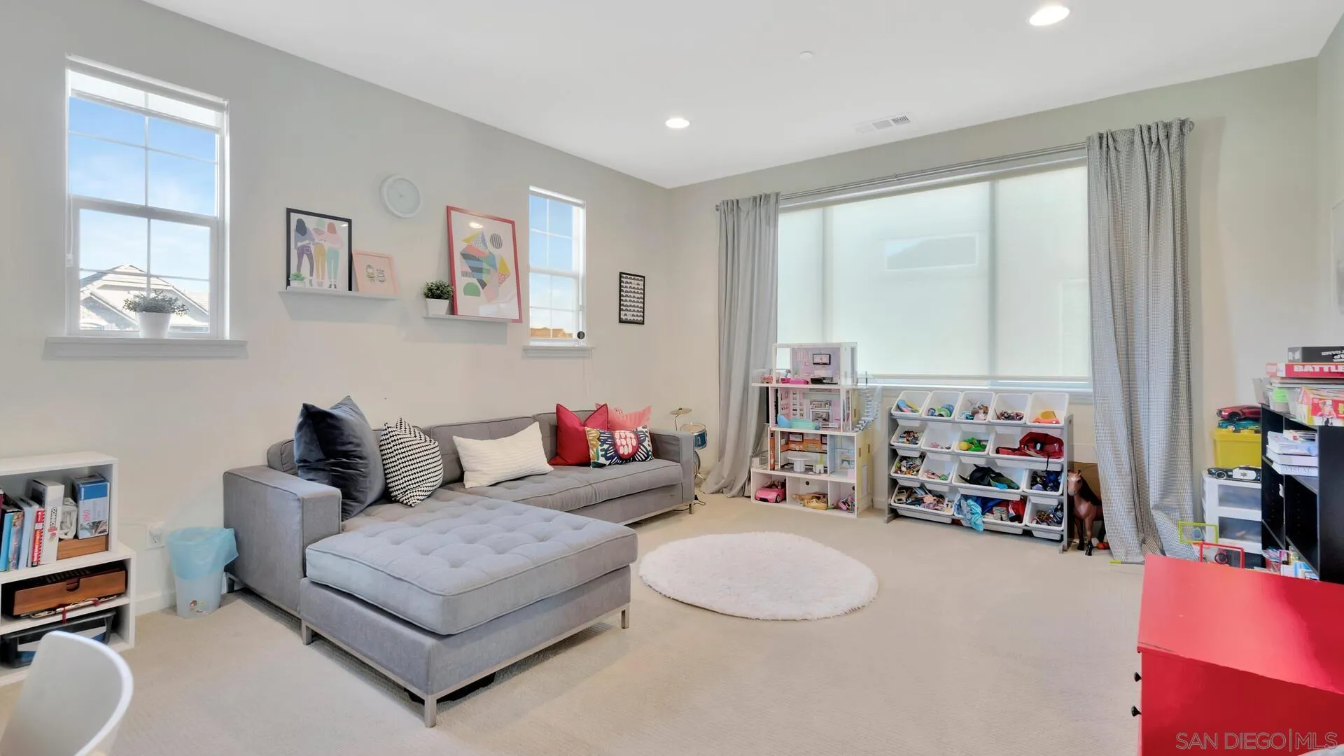17568 Ralphs Ranch Road San Diego, CA 92127 - Photo 26 of 59 a living room with furniture and a window