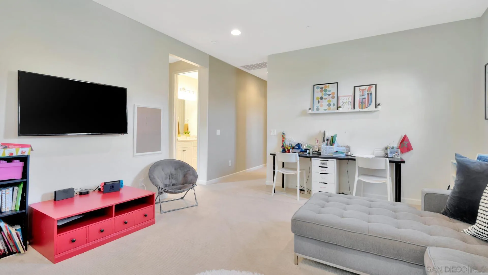 17568 Ralphs Ranch Road San Diego, CA 92127 - Photo 27 of 59 a bedroom with furniture and a flat screen tv