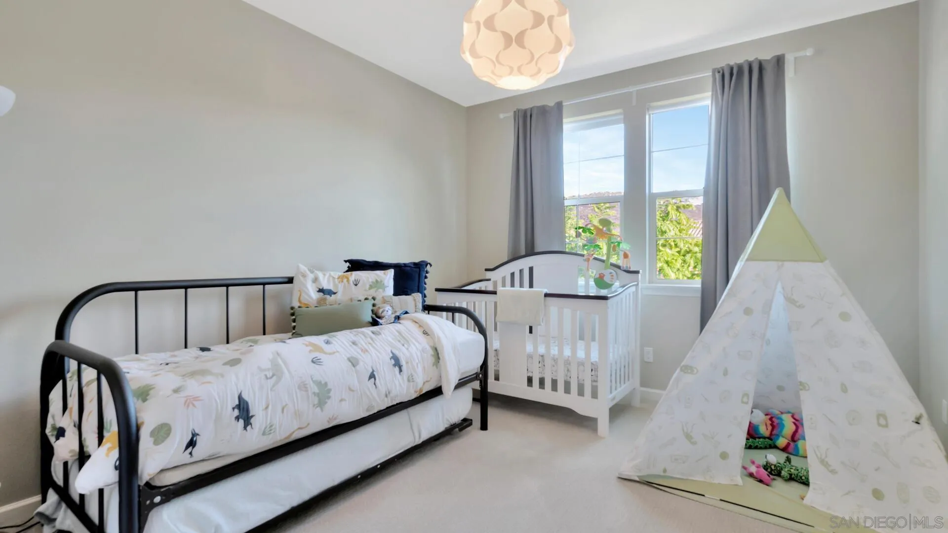 17568 Ralphs Ranch Road San Diego, CA 92127 - Photo 28 of 59 a bed room with two beds and a window