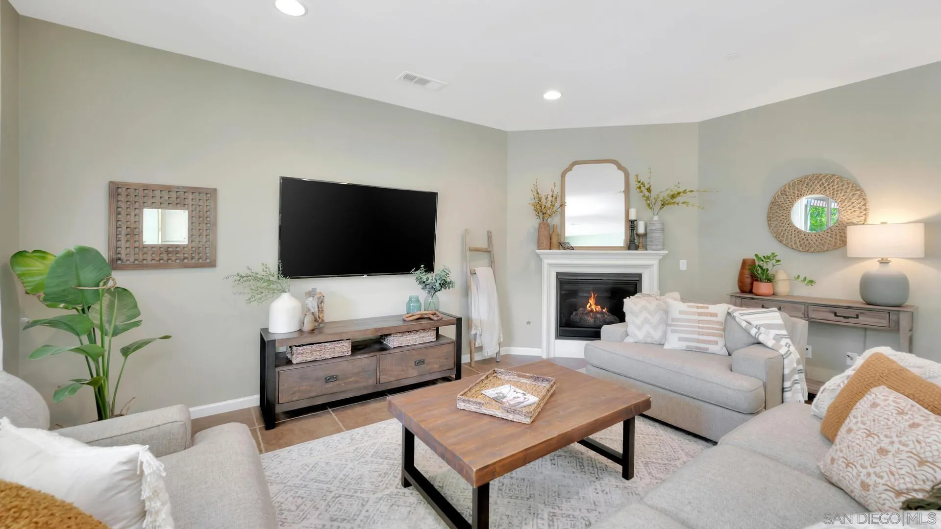 17568 Ralphs Ranch Road San Diego, CA 92127 - Photo 3 of 59 a living room with furniture and a flat screen tv